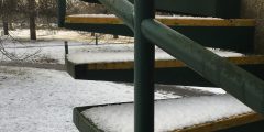 Metal steps covered in snow